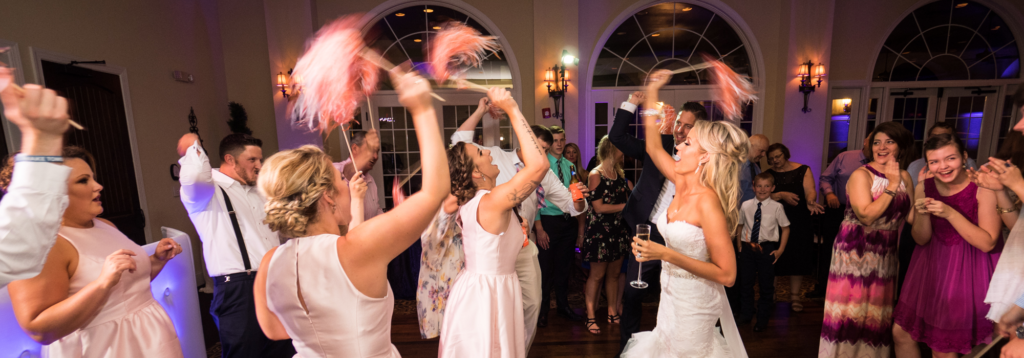 Bridal Party DAncing on a Packed Dance Floor with Charlotte Wedding DJ Remarkable Receptions